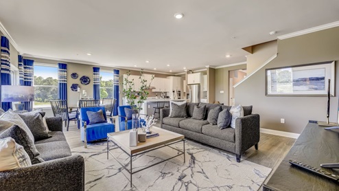 The foyer unfolds into a sought-after open-concept living space.