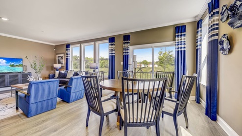 The casual dining area overlooks the living room.