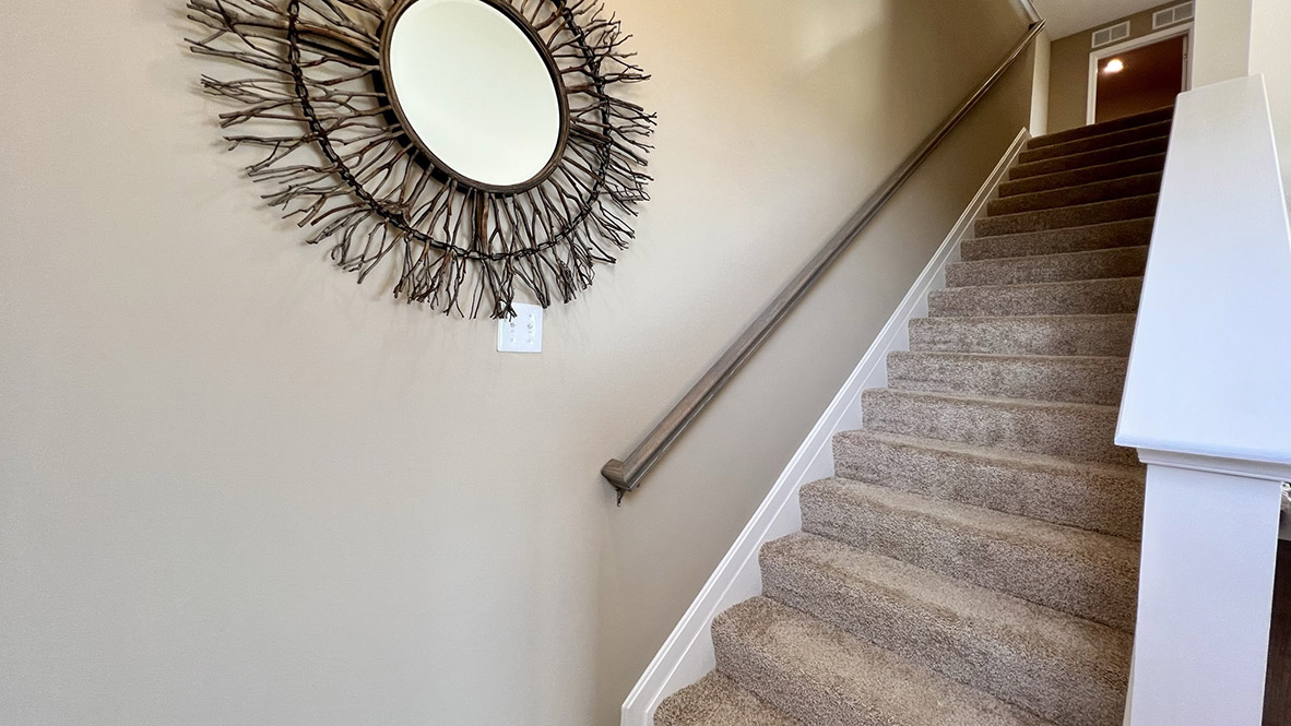 As you make your way up the stairs that are nestled in the corner of the great room you will find a vast landing.