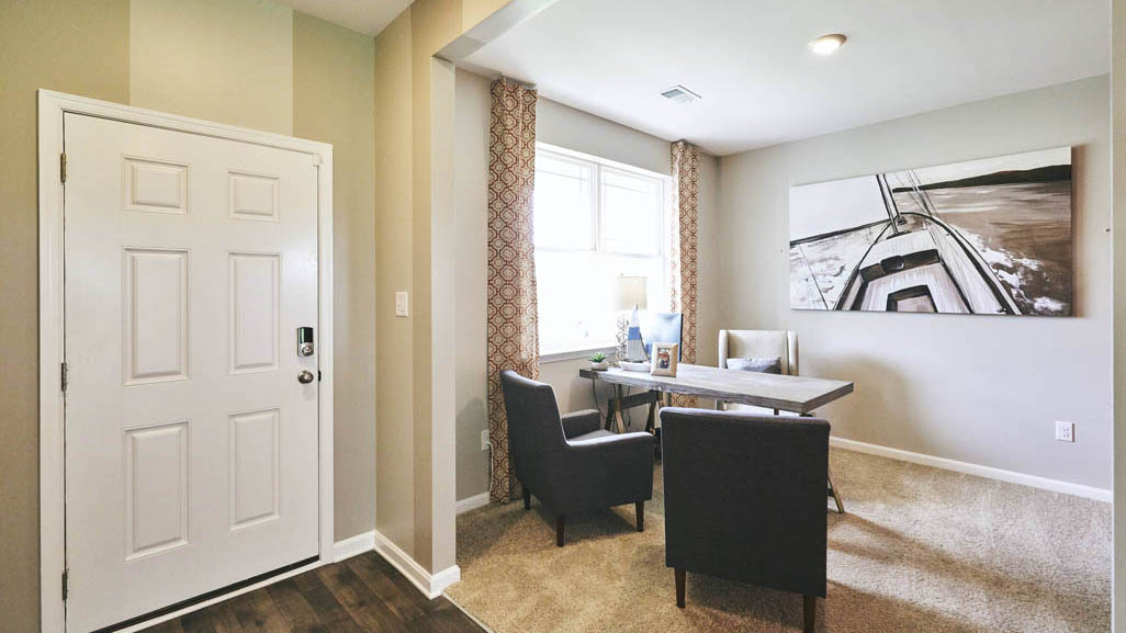 The functional flex room can be used as an office, playroom, or formal dining space.