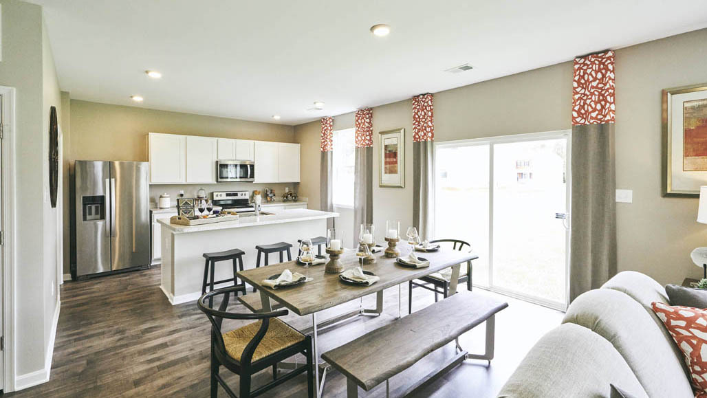 The kitchen flows seamlessly into the dining space and the sizeable great room.