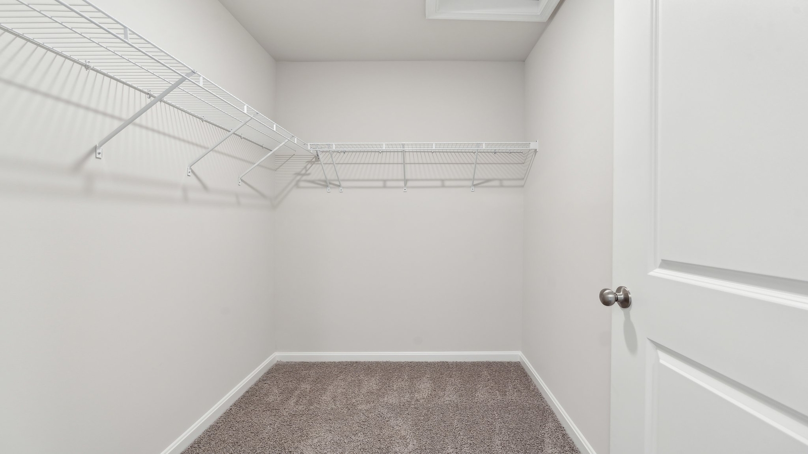 The private bathroom has an impressive walk-in closet.