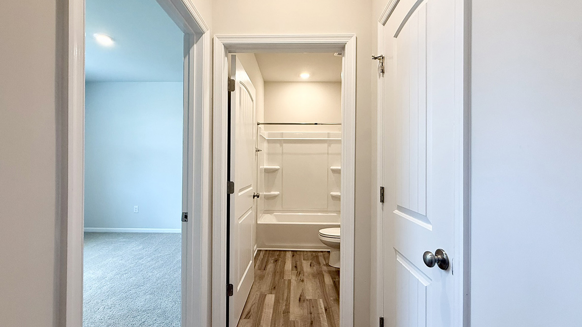 The two guest bedrooms and guest bathroom to be separate from the living areas of the home.