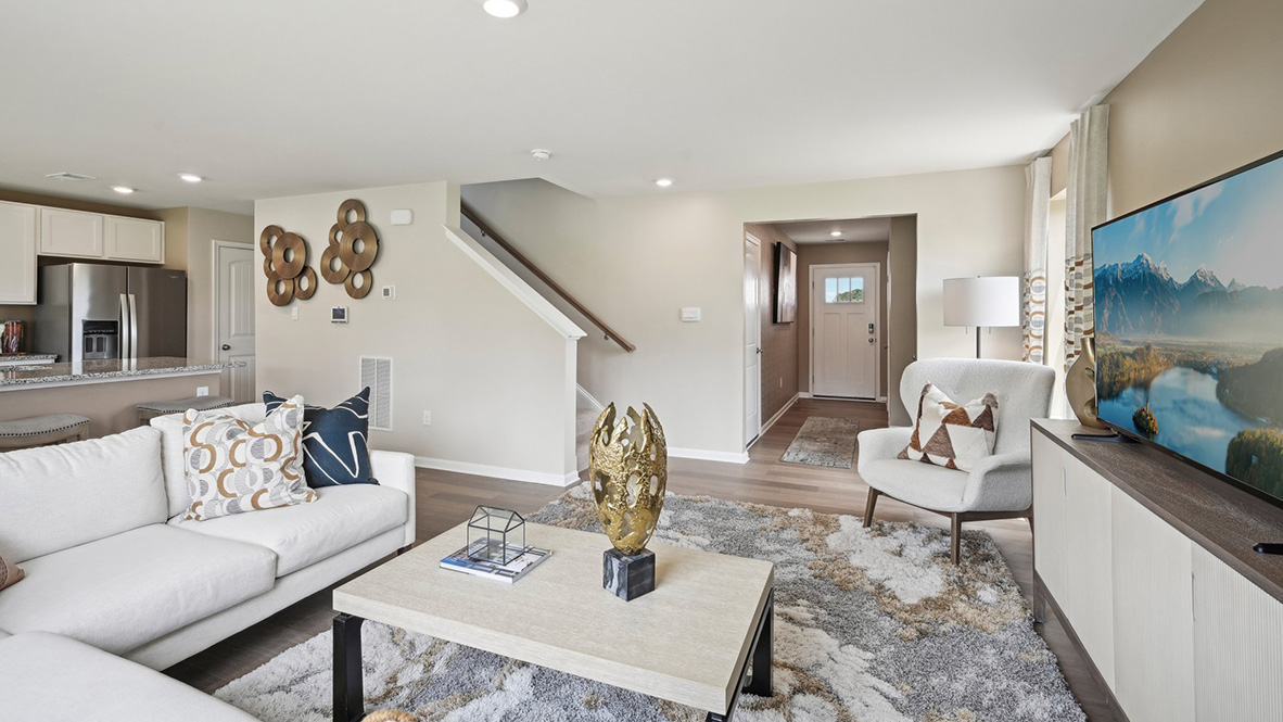 The stairway is located off of the foyer.