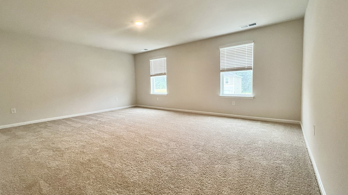 Upstairs, you will enter the inviting loft.