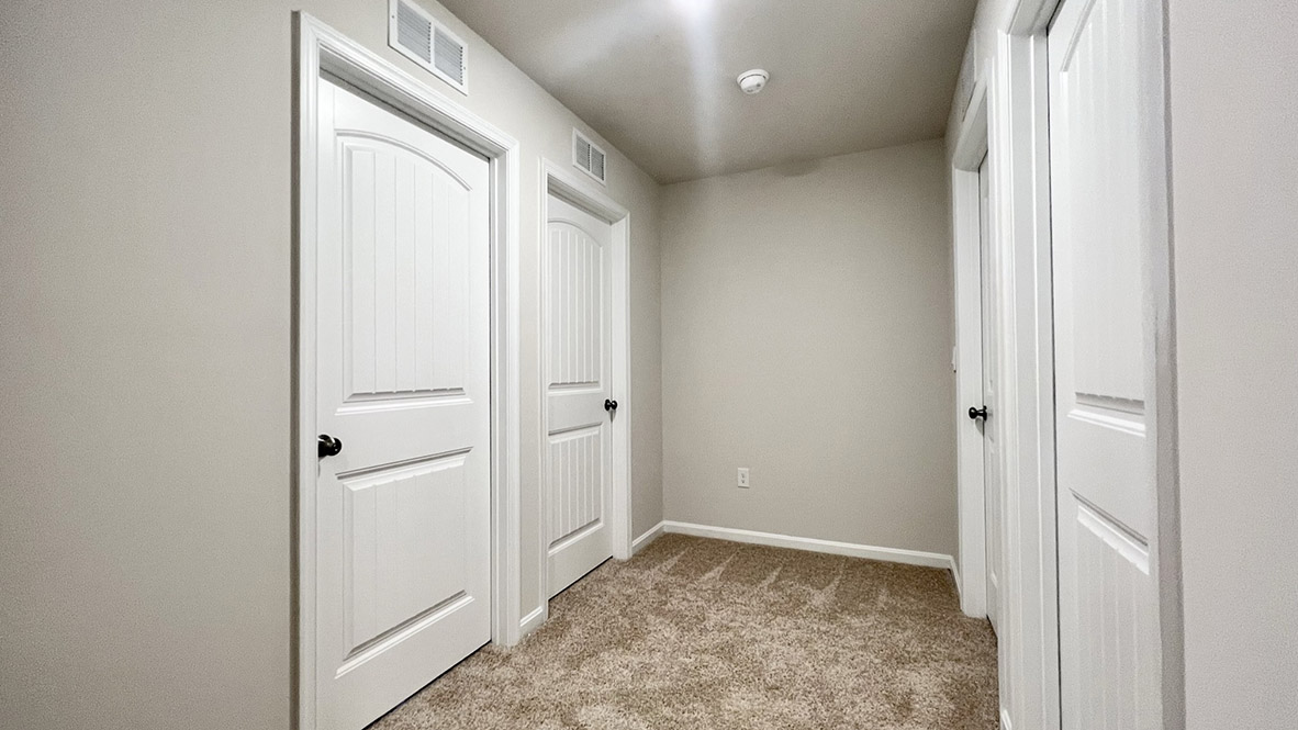 The three additional roomy secondary bedrooms complete the upstairs.