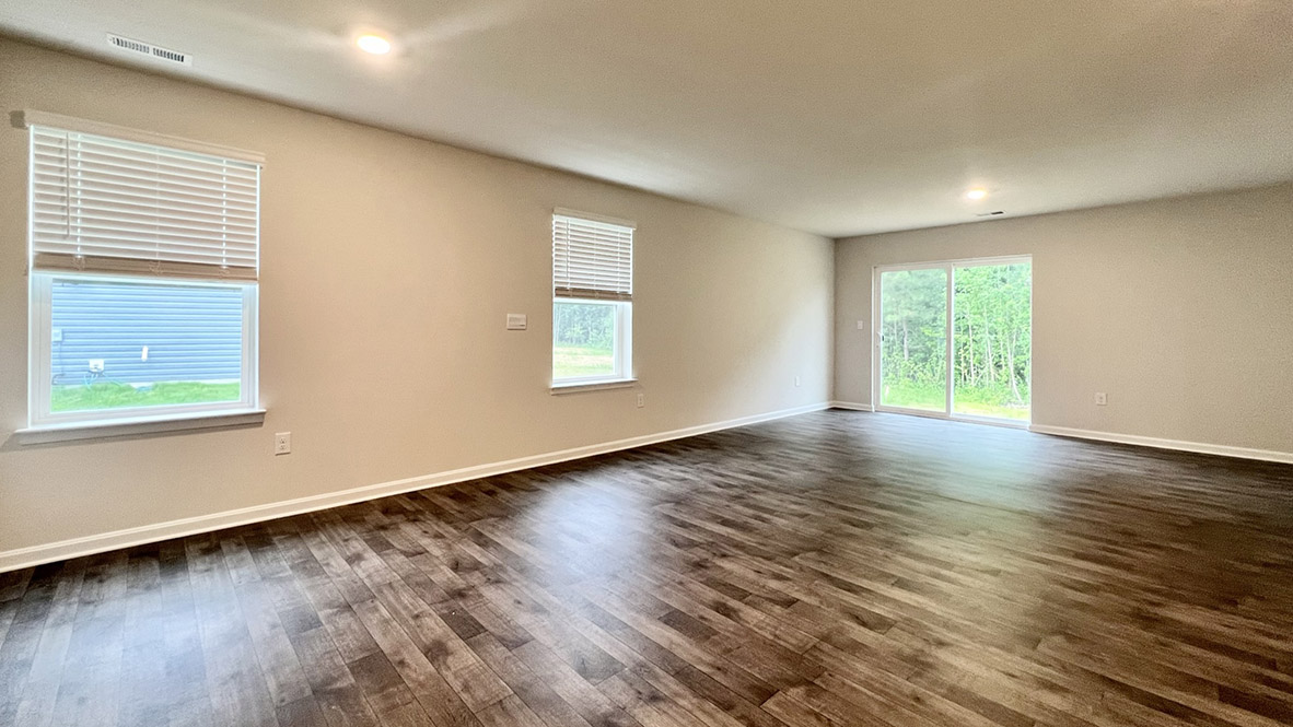 The kitchen flows perfectly into the sizeable living room.