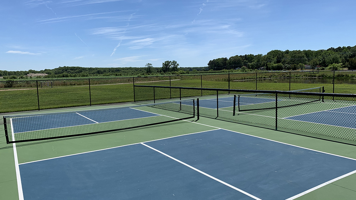 Tennis and pickleball courts are available.