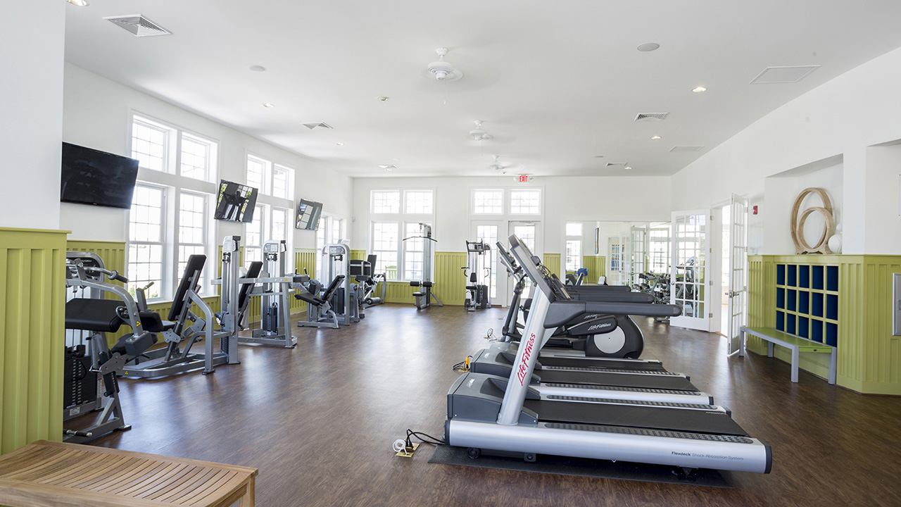 The fitness center is located inside the clubhouse.