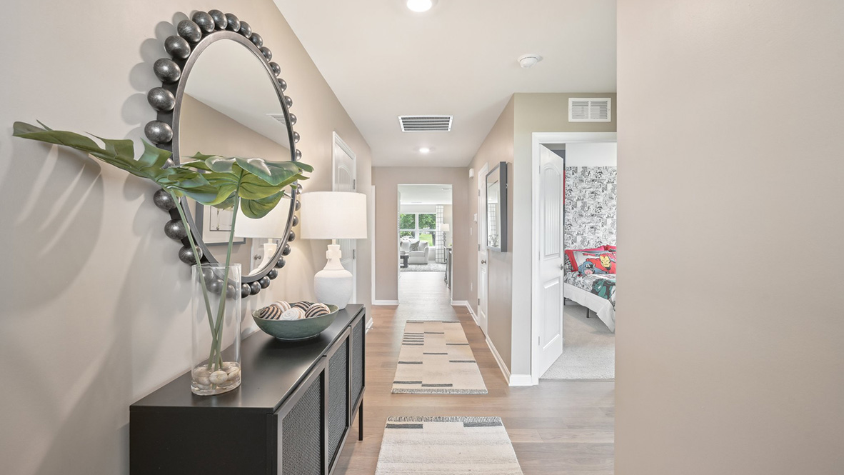 As you enter the home, there is a long hallway.