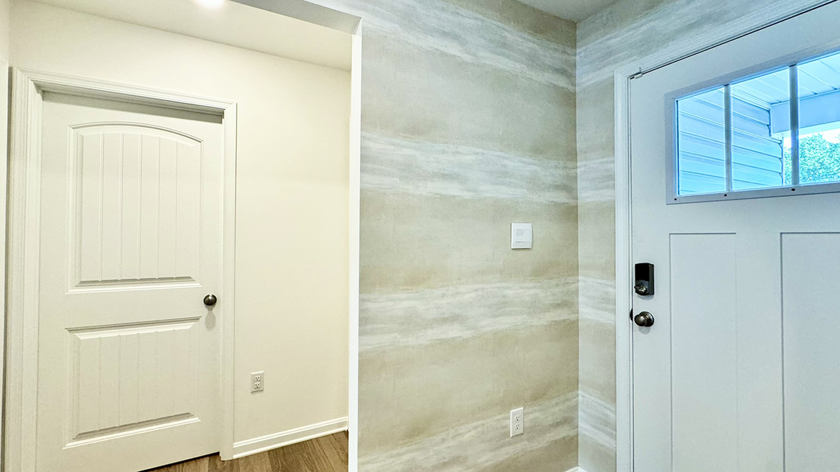 The short hallway will lead you to the two roomy, secondary bedrooms and the full bathroom.