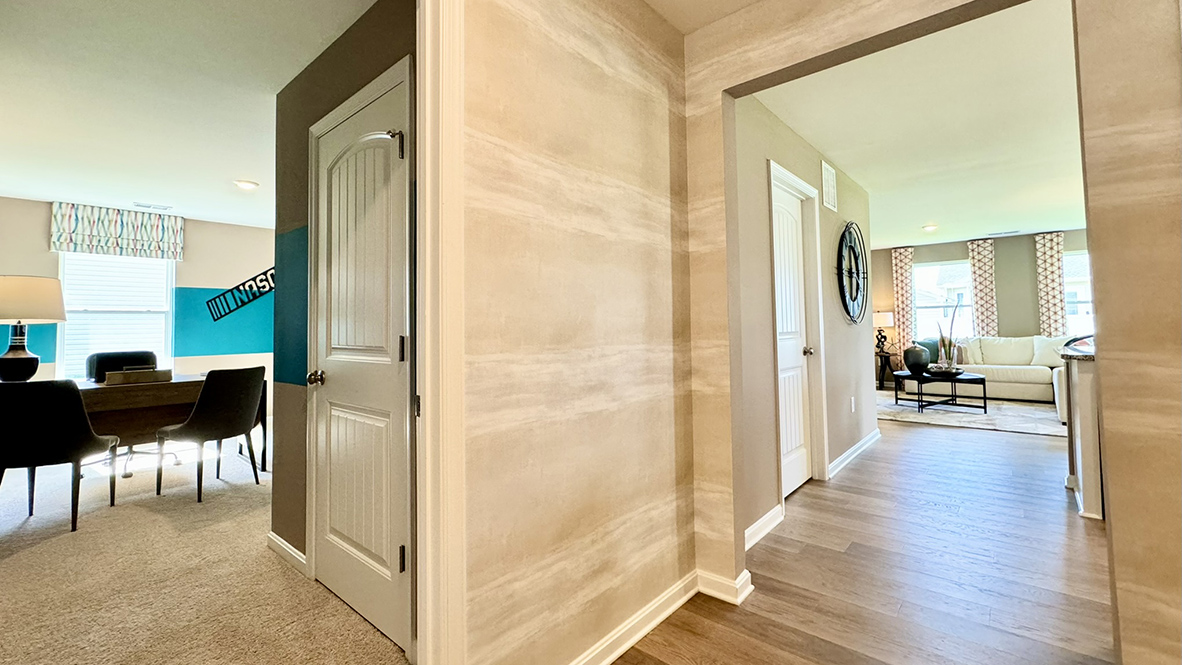 The home's fourth bedroom is strategically positioned away from the other bedrooms.