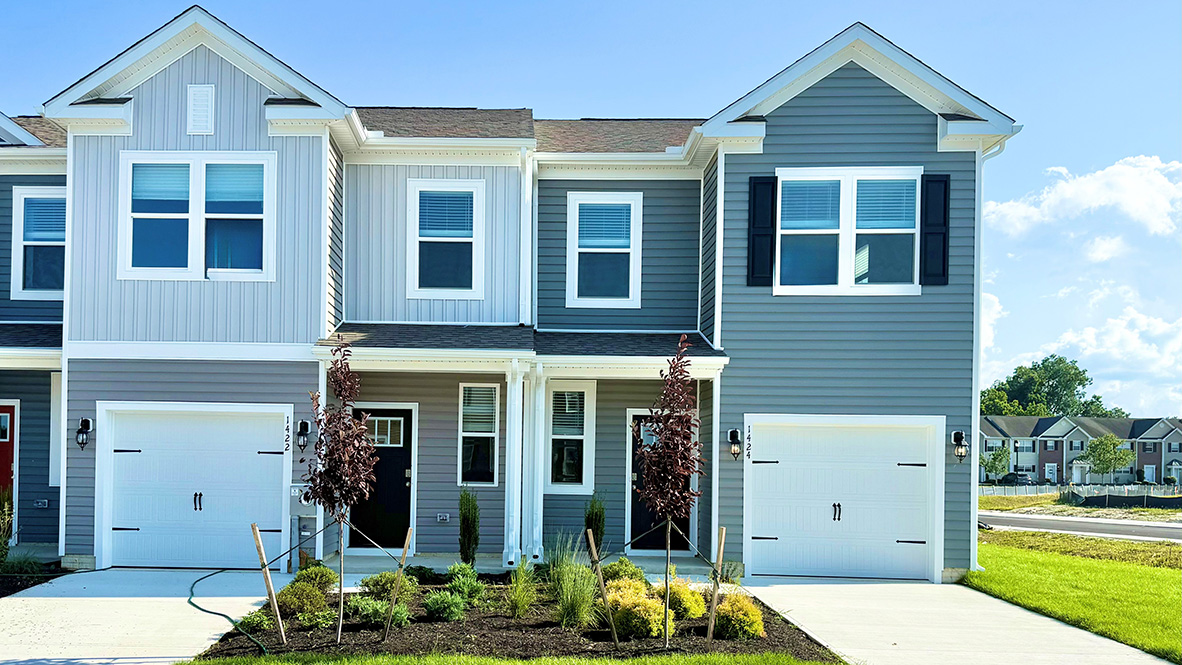 An end-of-unit townhome at 21464 Farmington Road in Frankford, DE.