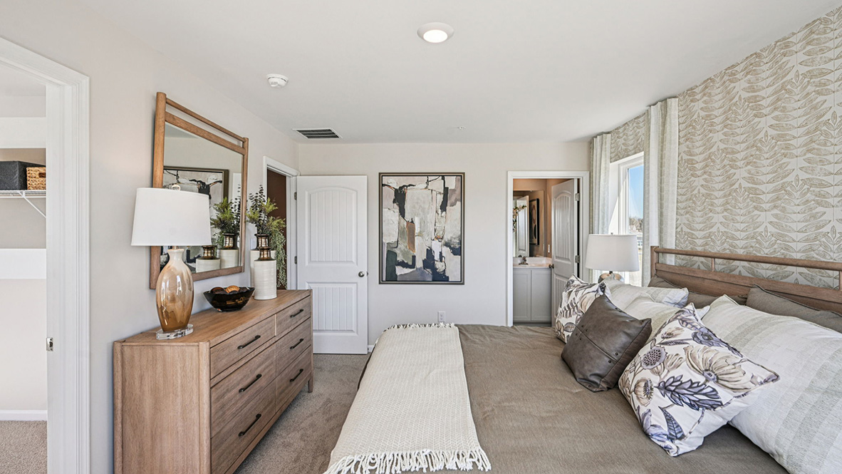 Upstairs, the spacious main bedroom comes complete with an oversized walk-in closet.