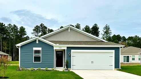 A Boardwalk ranch home with blue siding.