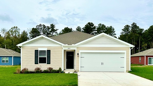 A Freeport ranch home with tan siding.