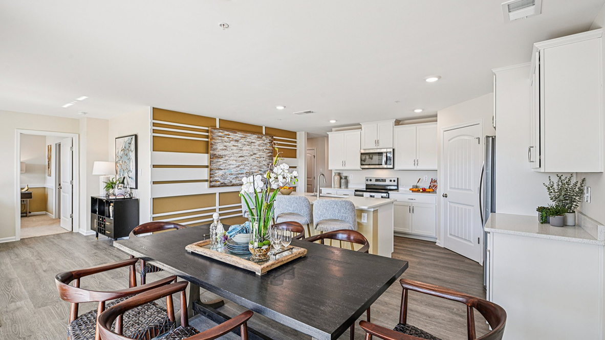 The kitchen is open to the informal dining area.