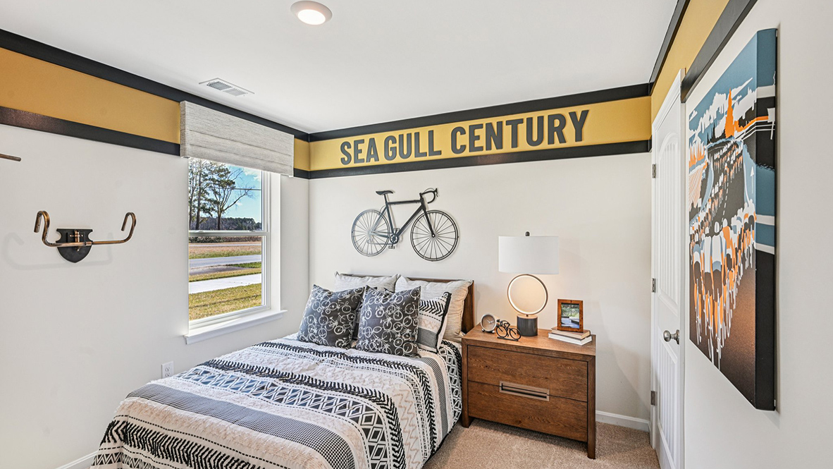 One guest bedroom has a window in the corner.