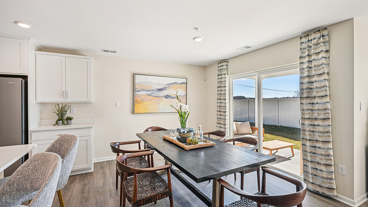 The dining area looks out to the back yard.
