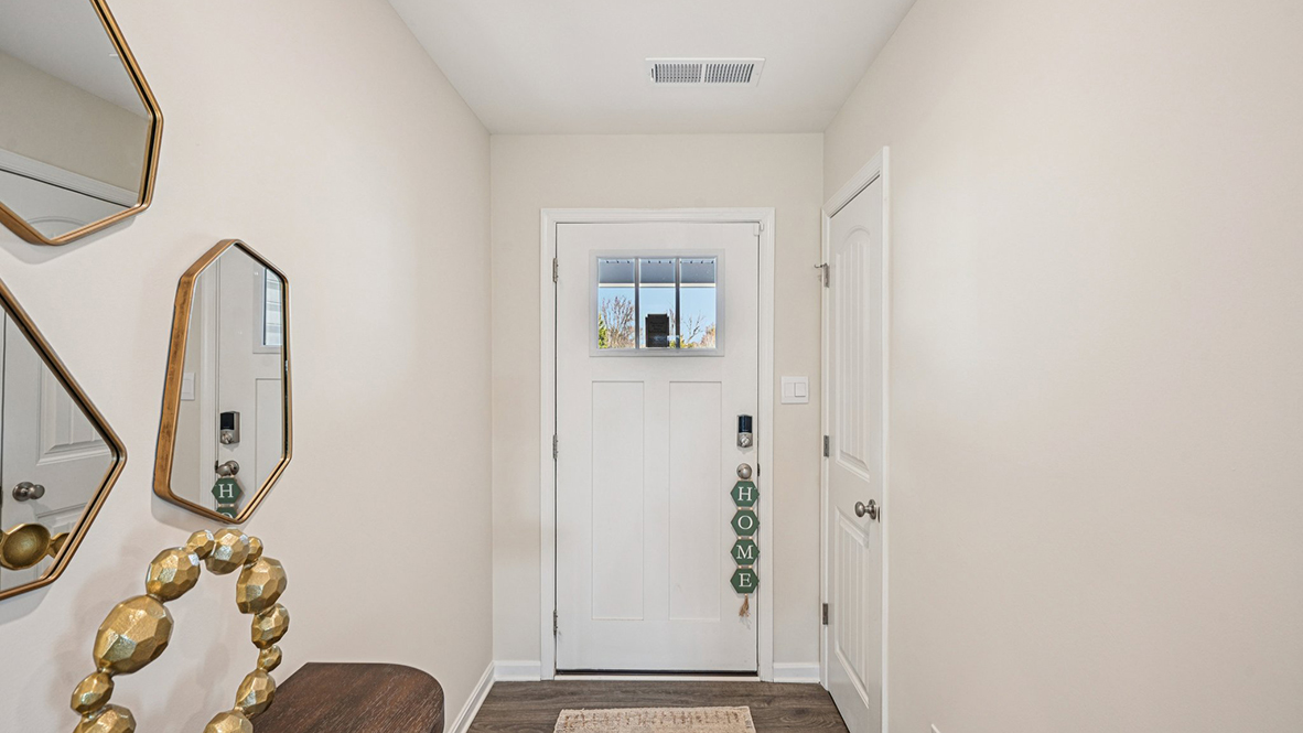 As you enter the home, there is a long hallway.