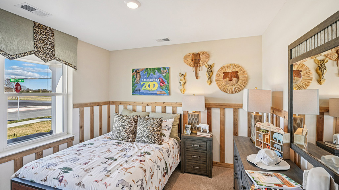 One guest bedroom has a large double window.