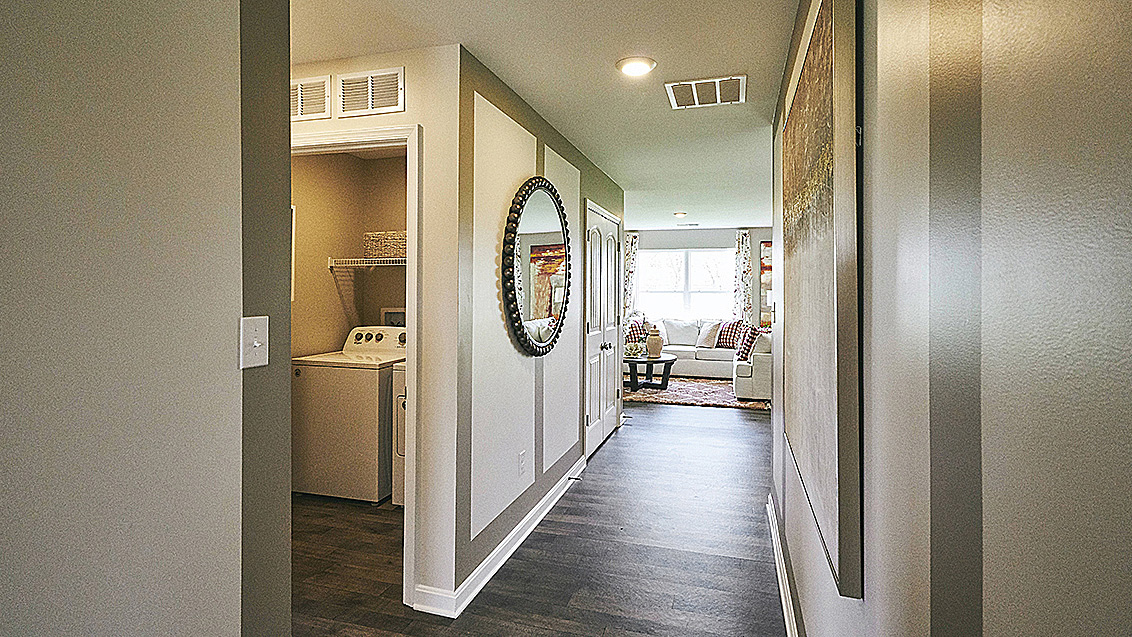 As you enter the welcoming foyer the convenient coat closet is close by.