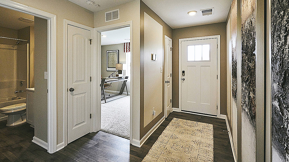 As you enter the welcoming foyer the convenient coat closet is close by.