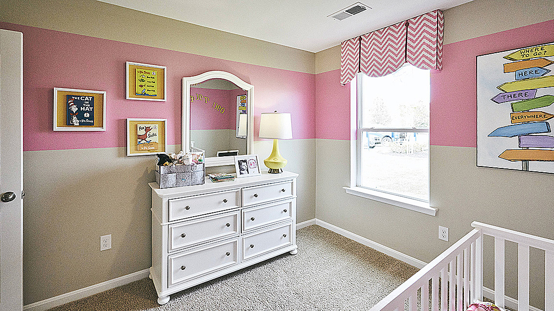 Two secondary roomy bedrooms are located off the foyer and share a full bathroom.