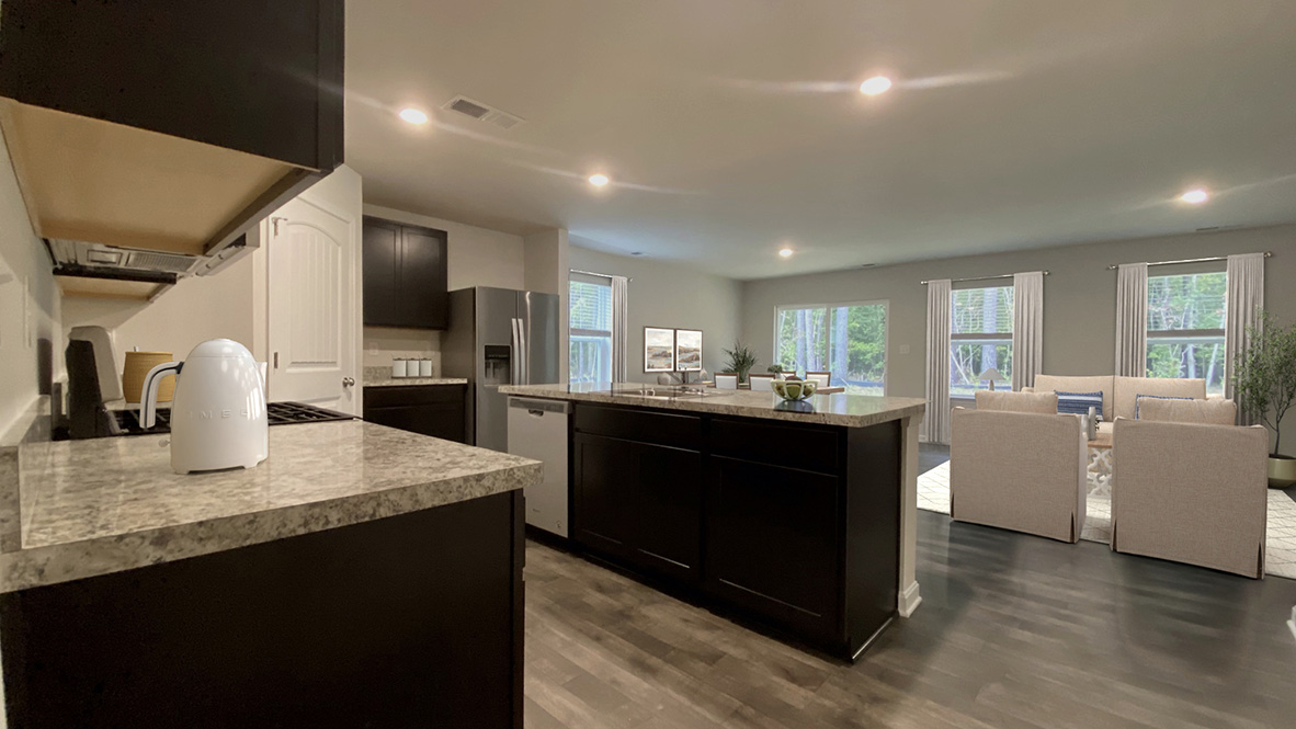 Lismore open floor plan from kitchen leading to living area.