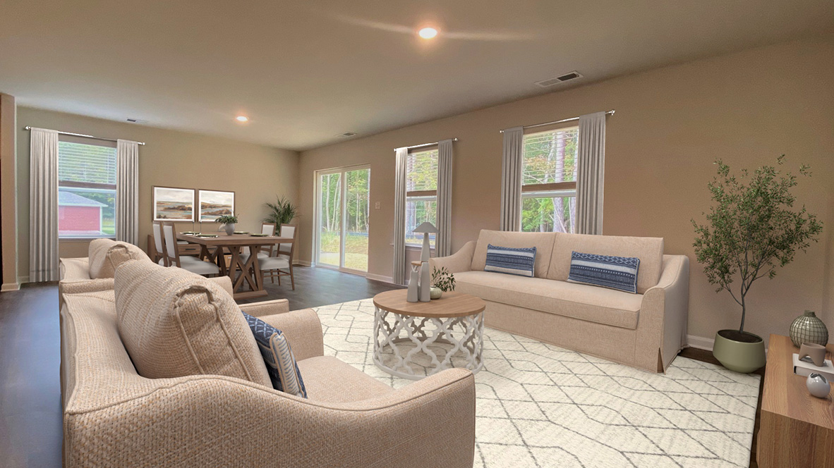 The ample great room and dining area both offer an abundance of natural light.