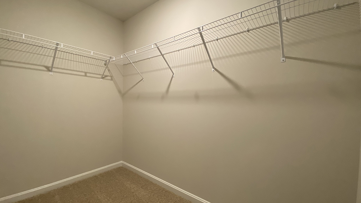 The owner's suite has a large walk-in closet.
