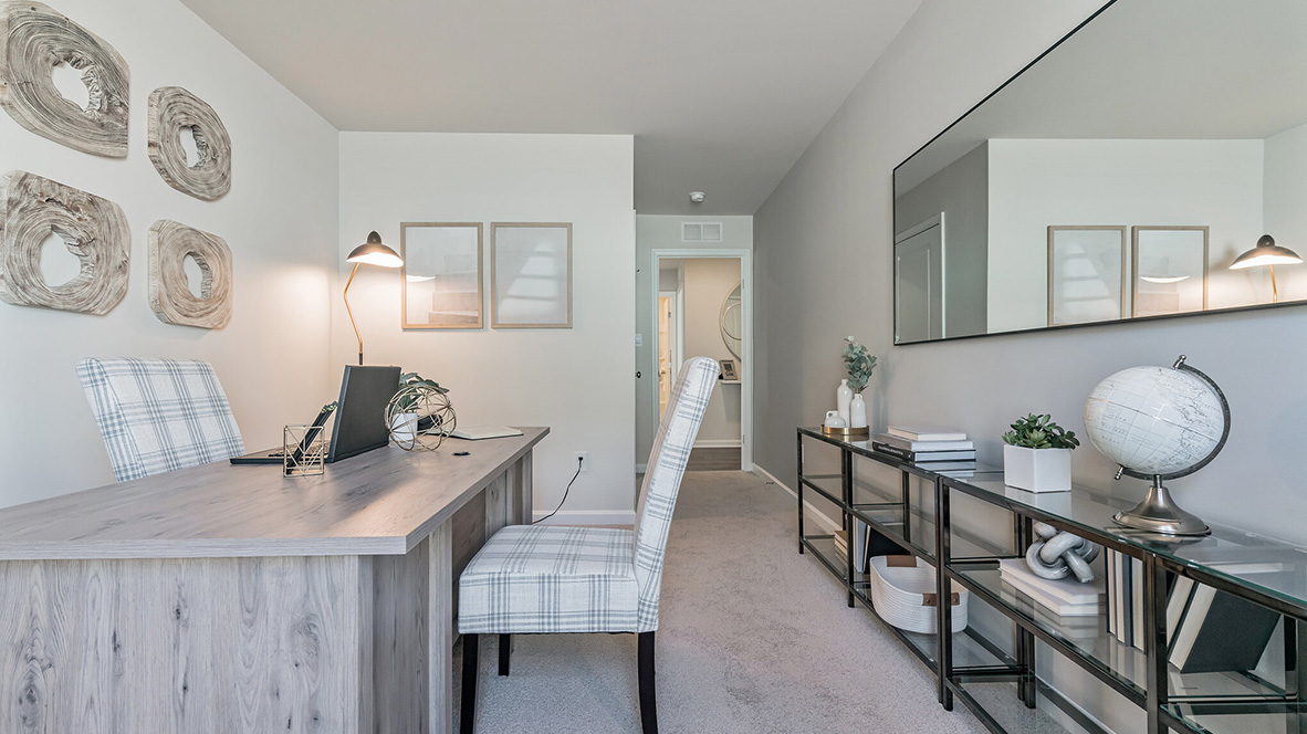 A spacious guest bedroom with a closet is in the front of the home.