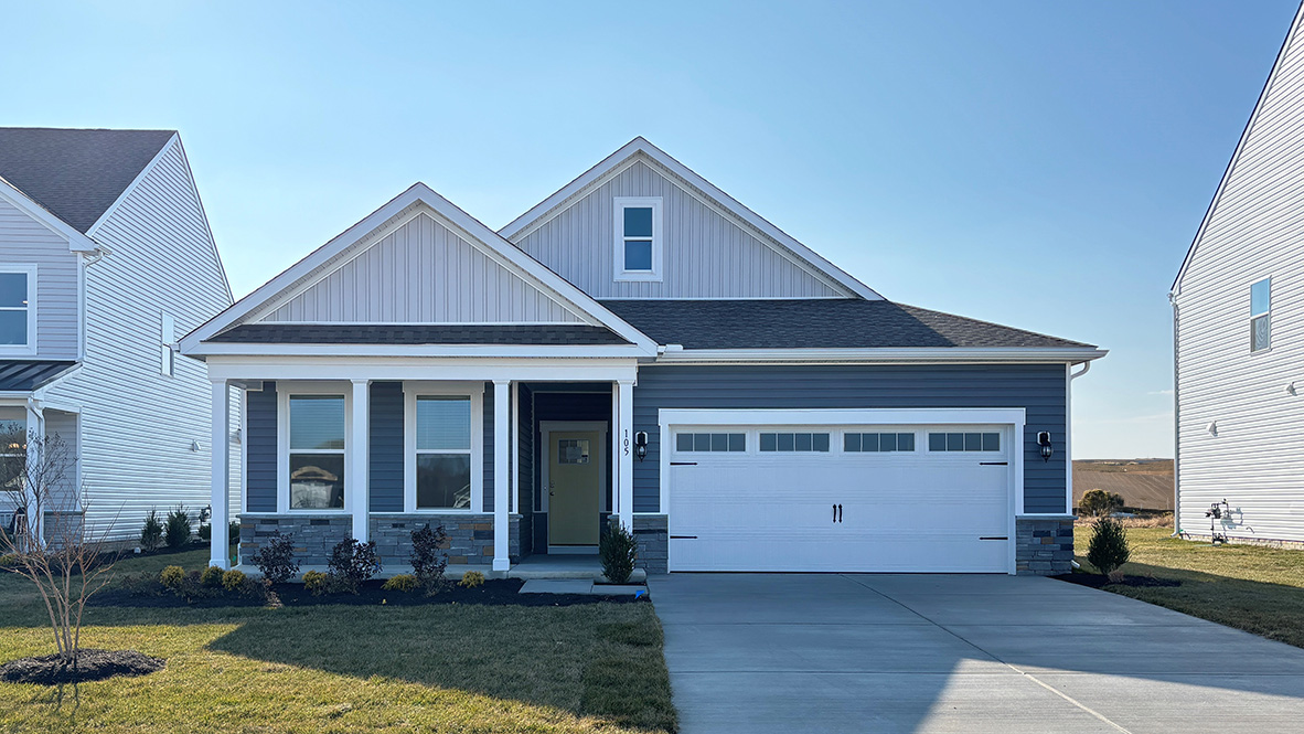 A Bristol ranch home with blue siding.