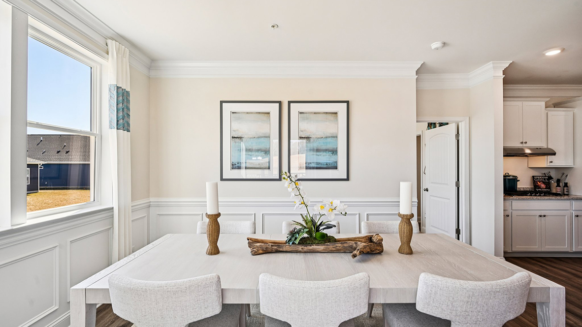 The dining area leads to the rear-covered patio.