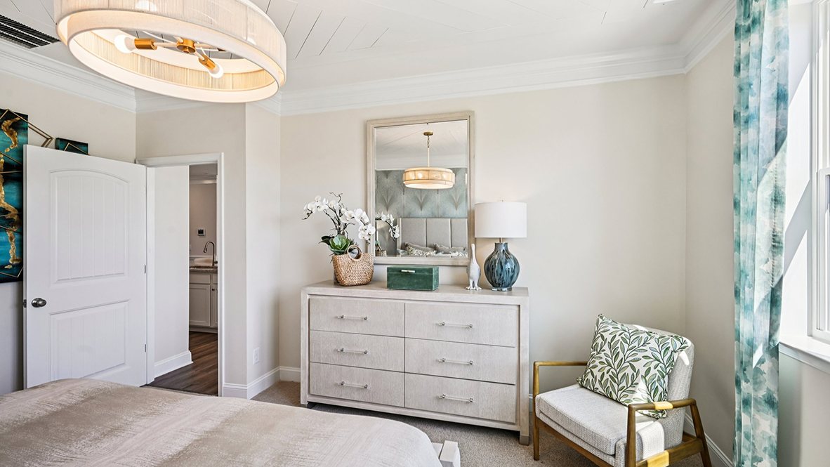 The large primary bedroom is a retreat in the back of the home.