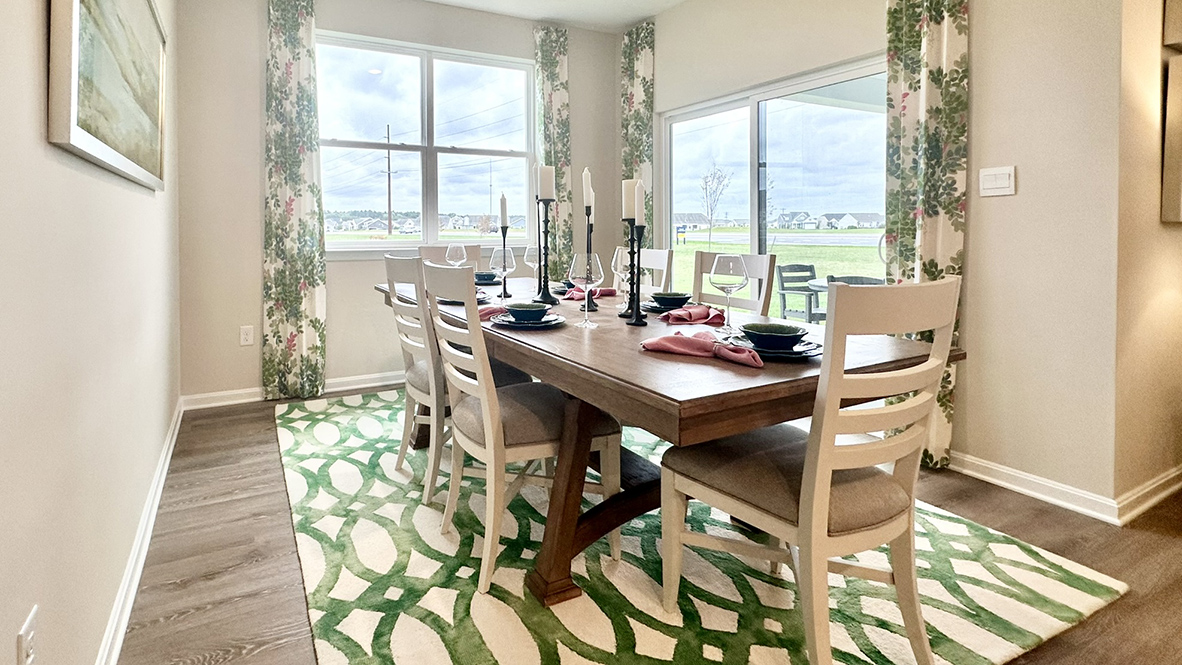 The dining area leads to the rear-covered patio.