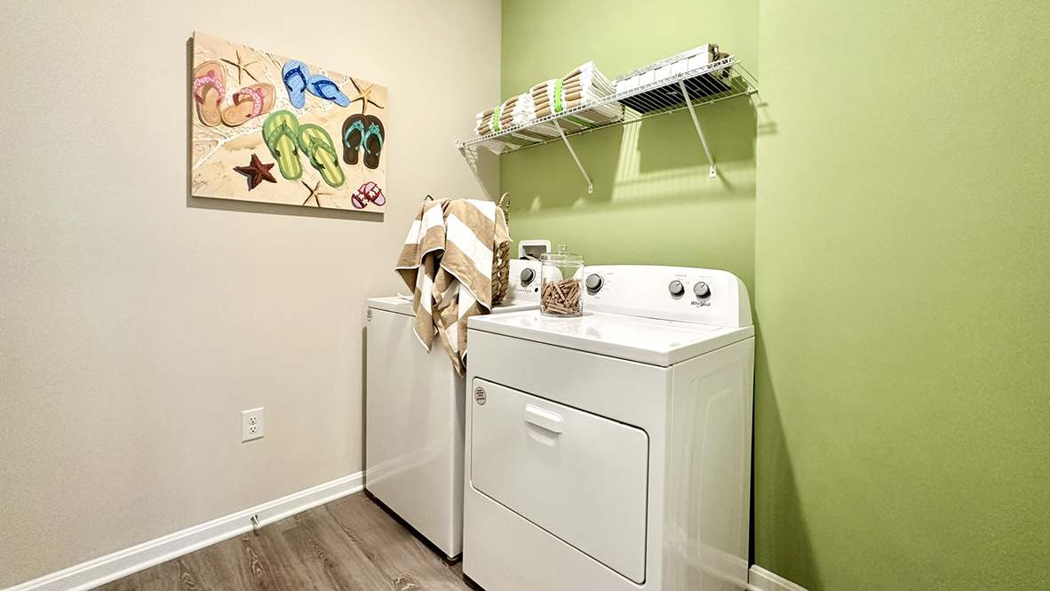 The laundry room is located off the two-car garage.