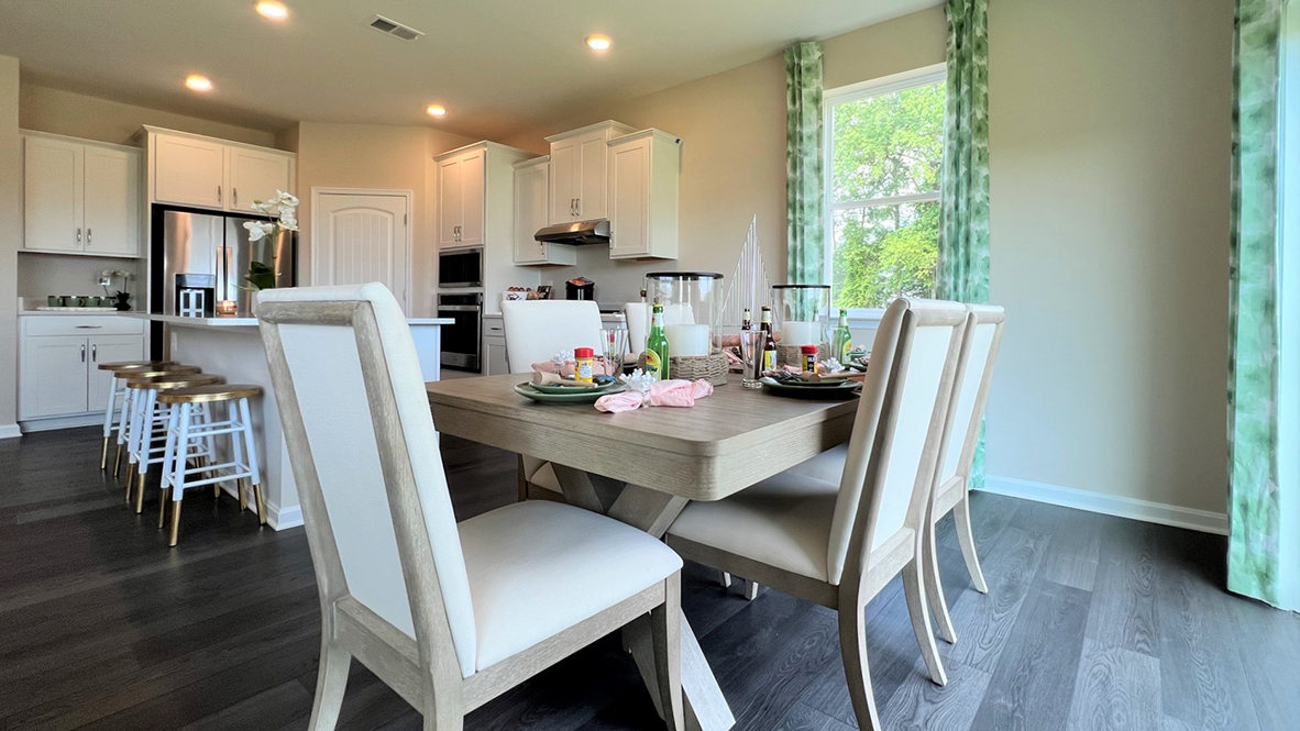The kitchen flows neatly into the informal dining area.