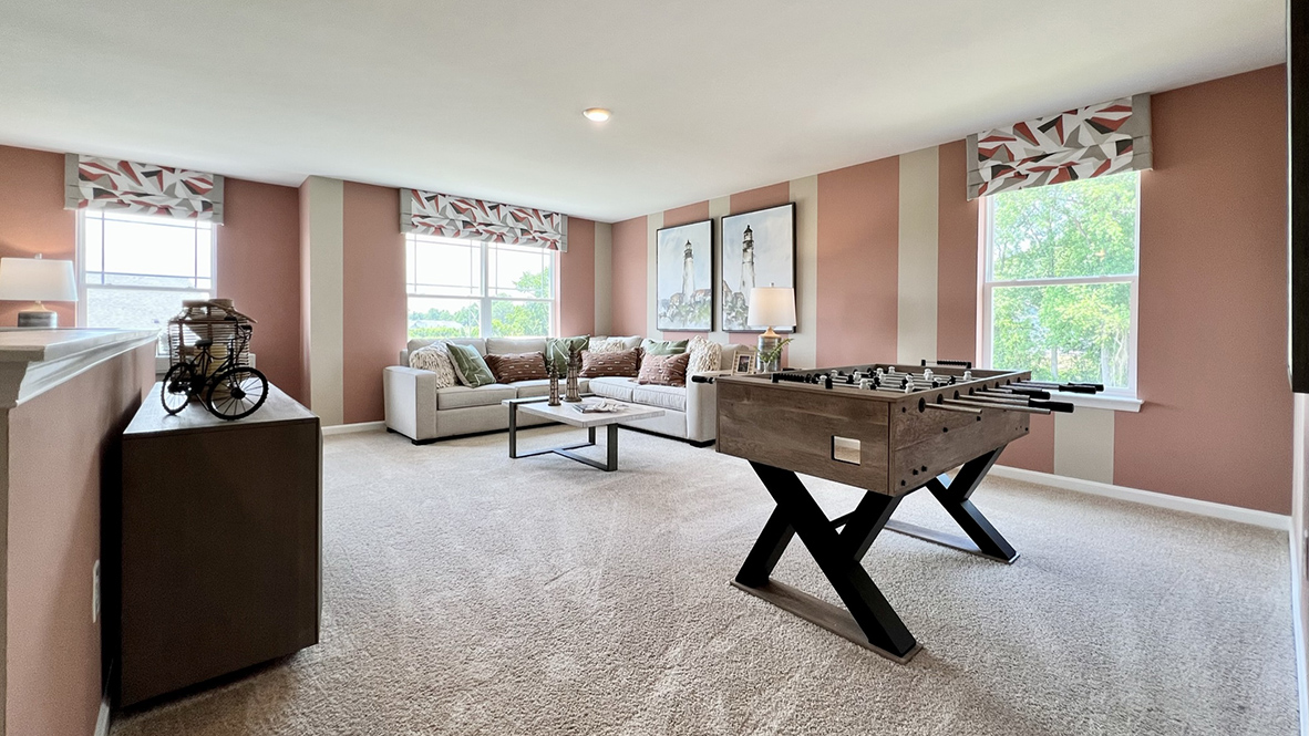 The upstairs loft is an added family room.