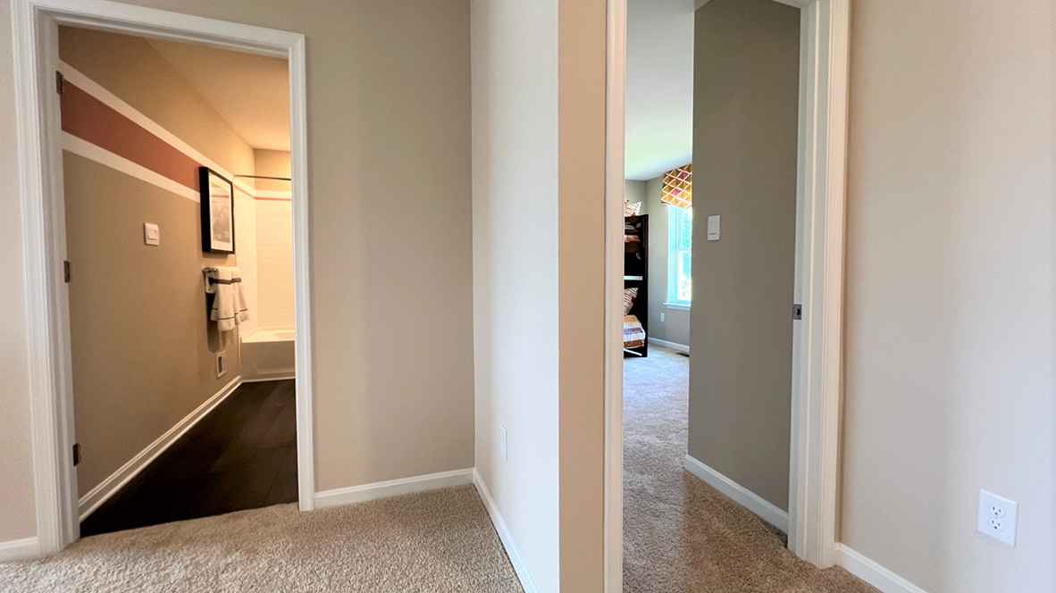 The upstairs main hallway takes you to each bedroom.