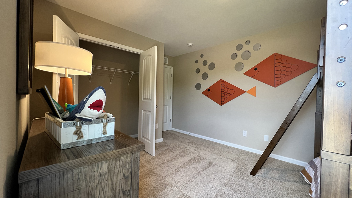 The secondary bedroom has a large closet.