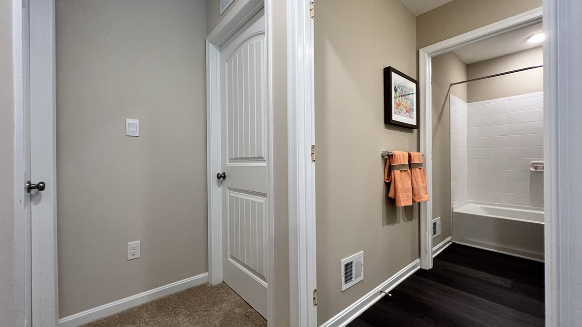 The upstairs hallway takes you to another bathroom.