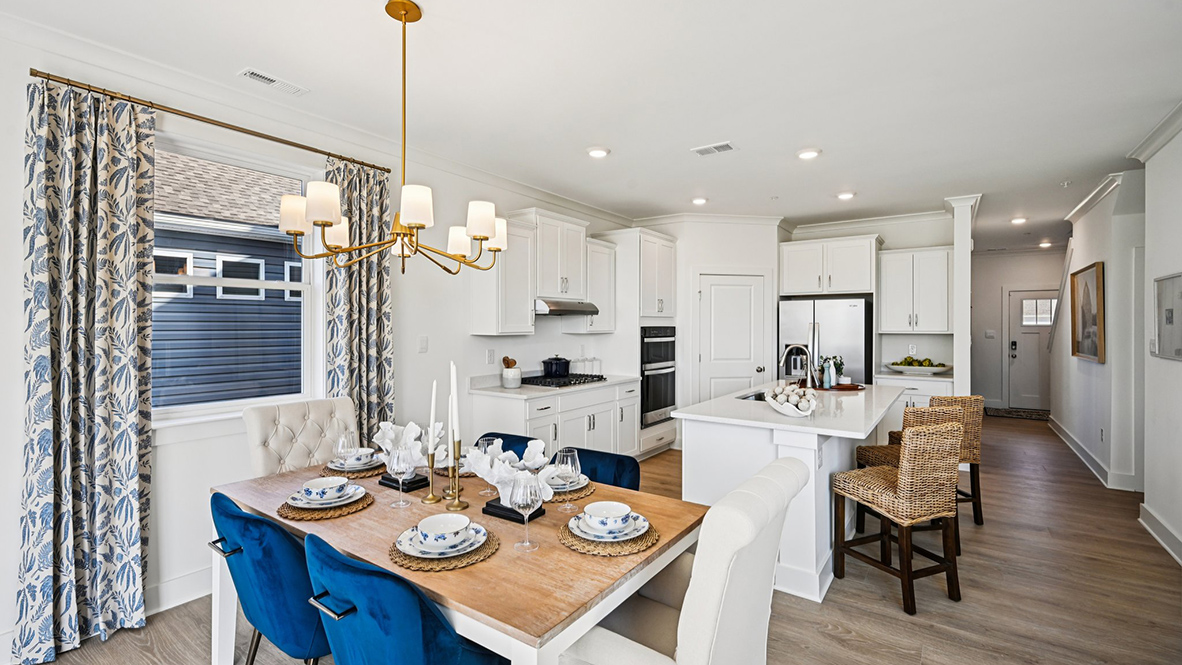 The kitchen flows neatly into the informal dining area.