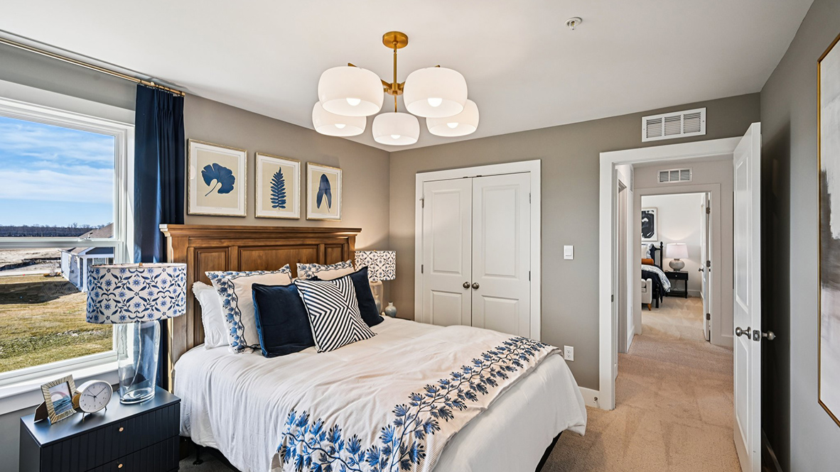 The fifth bedroom has plenty of natural light.