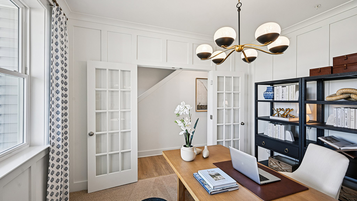 The flex room has glass French doors.