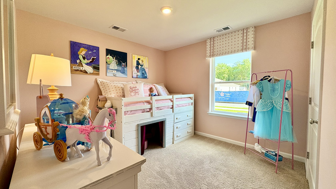 Two roomy, secondary bedrooms are in the front of the house.