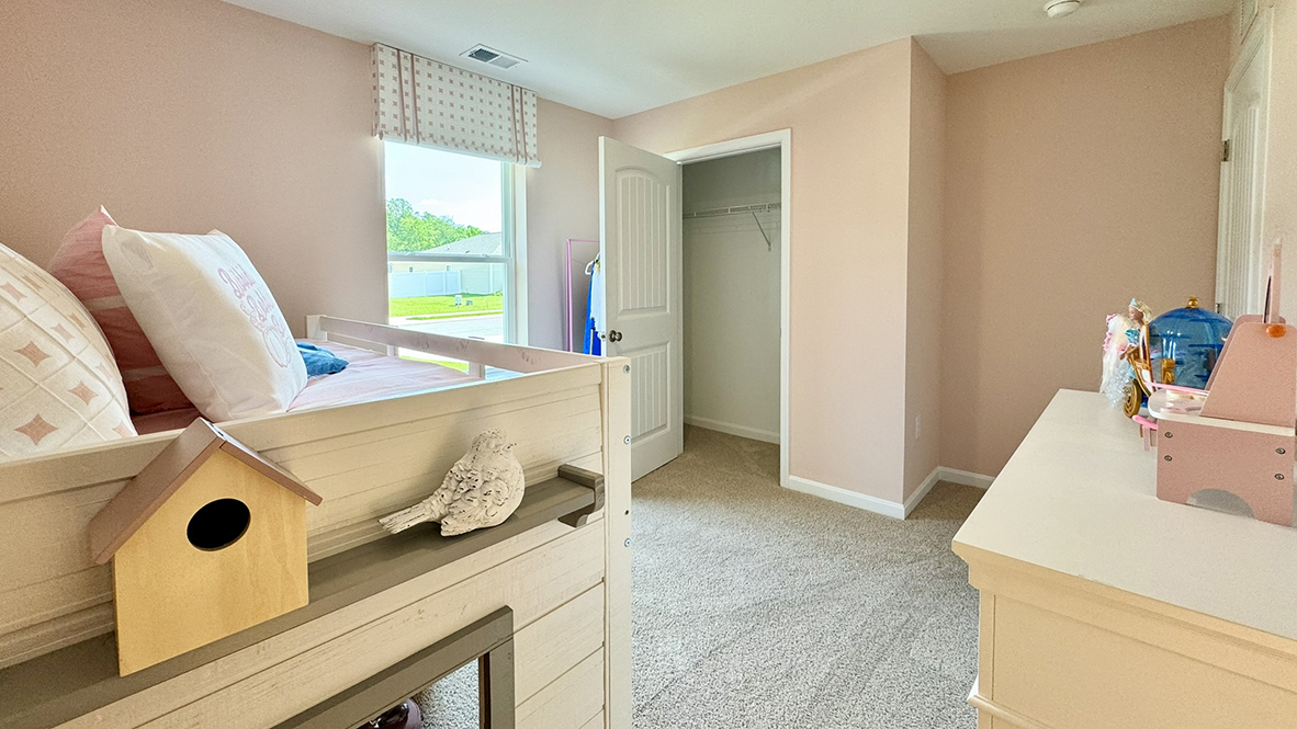 Two roomy, secondary bedrooms are in the front of the house.