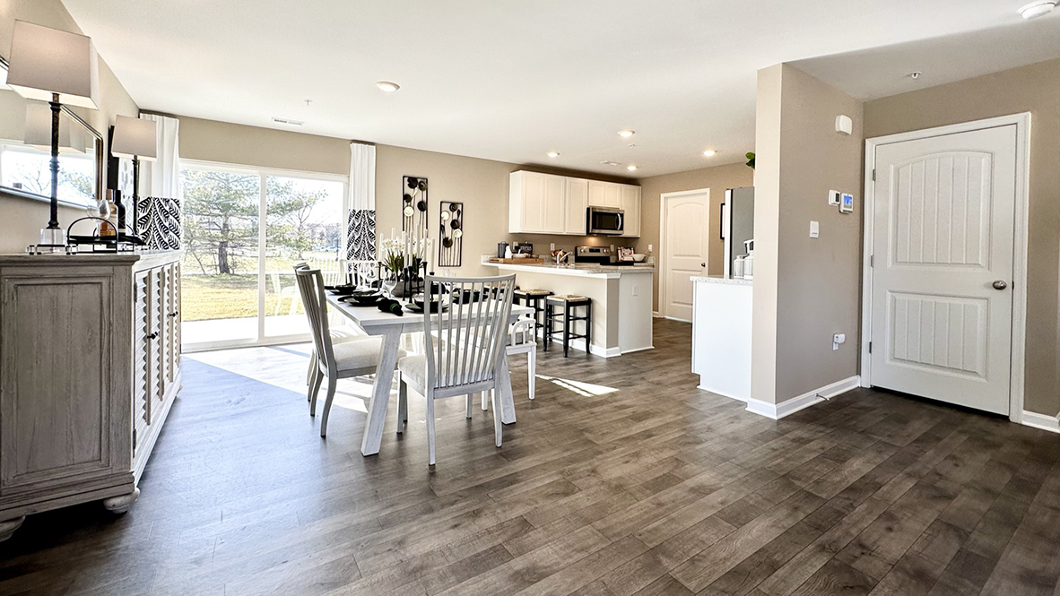The family room is open to the dining space and the family-friendly kitchen.