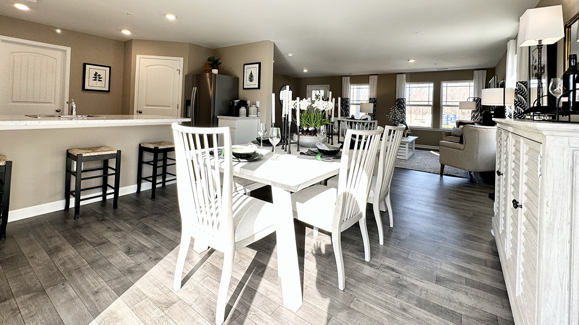 The family room is open to the dining space and the family-friendly kitchen.