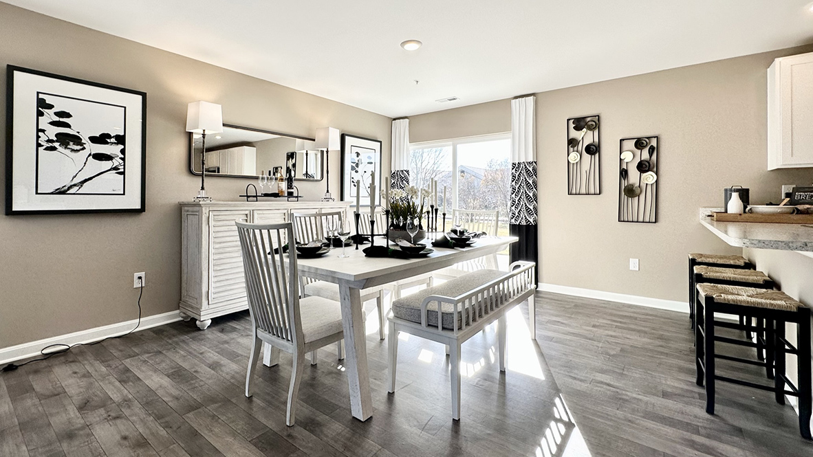 The family room is open to the dining space and the family-friendly kitchen.